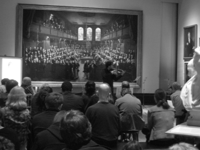 a violin in the portrait gallery